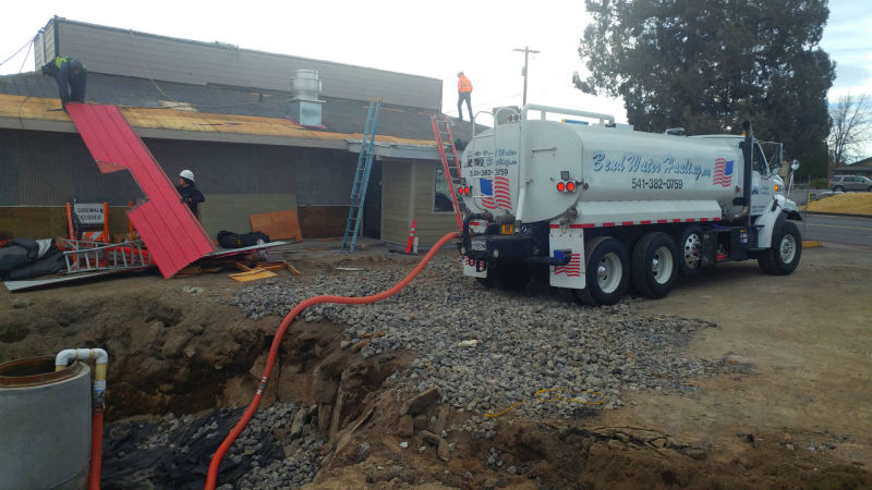 Image of water delivery truck onsite at jobsite